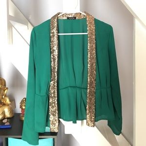 Green blazer with gold sequin.